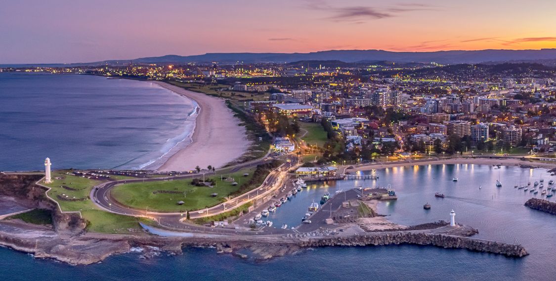 Sun Setting Over The City Of Wollongong.